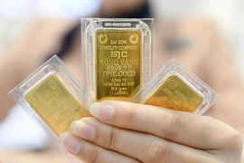 С 10 октября Государственный банк Вьетнама больше не будет напрямую заниматься экспортом необработанного золота и импортом его для производства слитков. (Фото: ВИА)
