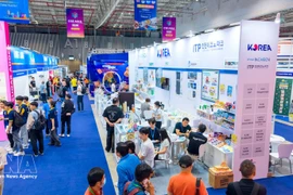 Посетители 34-й Вьетнамской международной торговой ярмарки 2025 года. (Фото: ВИА)