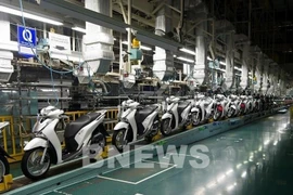 Линия по производству мотоциклов японской компании Honda Vietnam, расположенной в провинции Футхо. (Фото: ВИA)