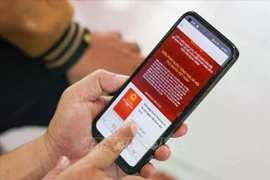 По состоянию на 20:00 26 мая более 17,1 миллиона граждан высказали свое мнение о предлагаемых поправках к Конституции 2013 года через приложение VNeID. (Фото: ВИA)