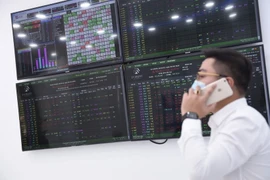 В ходе обзора в сентябре 2025 года **FTSE Russell** подтвердил, что Вьетнам выполнил все критерии для получения статуса вторичного развивающегося рынка, что отражает твёрдую приверженность реформам, направленным на повышение прозрачности и доступности рынка. (Фото: ВИА) 