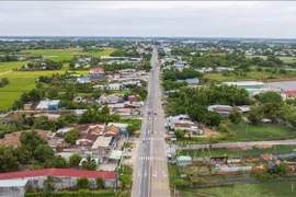 Национальная автомагистраль 22B, главная трасса, соединяющая Хошимин с международным пограничным пунктом Мокбай в провинции Тэйнинь, не удовлетворяет транспортным потребностям. Ожидается, что скоростная автомагистраль Хошимин – Мокбай снизит транспортную нагрузку. (Фото: ВИA)