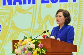 Губернатор Госбанка Нгуен Тхи Хонг выступает на конференции. Фото: Vietnam+