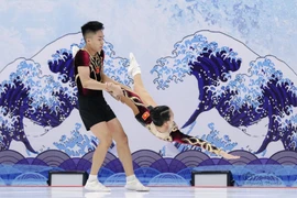 Спортсмены Чинь Куанг Мань и Фан Тхи Уйен Ньи