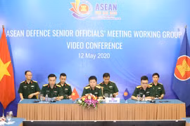 Вьетнамские делегаты присоединяются к видеоконференции (Фото: ВИA)