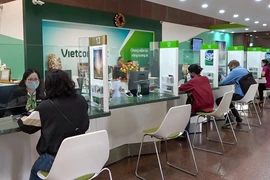 Обслуживание клиента в Vietcombank (Фото: ВИА)