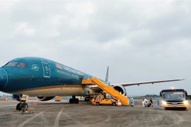 Самолет Vietnam Airlines в международном аэропорту Вандон провинции Куангнинь (Фото: VNA)