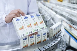 Молочная компания Vinamilk поставляет ореховые молочные продукты в Китай. (Фото: ВИА)