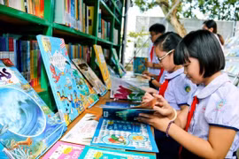 Дети на Дне Книги Вьетнама. (Фото: ВИА)