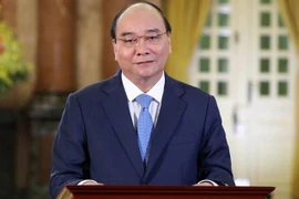 Президент Вьетнама Нгуен Суан Фук выступает на Деловом саммите АТЭС 2021. (Фото: ВИА)