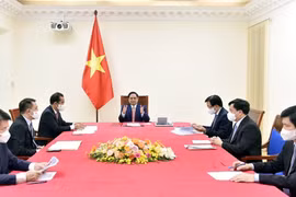 Премьер-министр Фам Минь Тьинь провел телефонный разговор с канцлером Германии Ангелой Меркель. (Фото: ВИА)