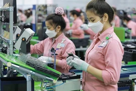Многие иностранные газеты оцениили, что Вьетнам создает привлекательную инвестиционную среду. (Фото: Báo Đầu tư)