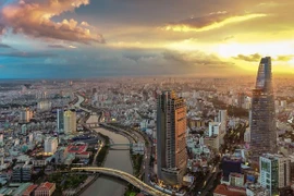 Standard Chartered Bank сохраняет устойчивый прогноз роста ВВП на 2024 год на уровне 6,7%. (Фото: baodutu.vn)