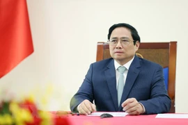 Премьер-министр Фам Минь Тьинь провел телефонный разговор с премьер-министром Австралии Энтони Альбанезе. (Фото: Зыонг Жанг/ВИА)