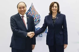 Президент Вьетнама Нгуен Суан Фук (слева) и вице-президент США Камала Харрис (Фото: ВИА) 
