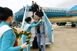 Международные пассажиры на рейсе Vietnam Airlines во Вьетнам. (Фото: интернет) 