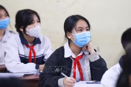По состоянию на 18 января 14 городов и провинций по всей стране разрешили учащимся всех классов вернуться в школу. (Фото: ВИА)