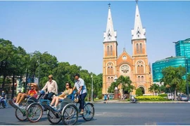 Туристы в Хошимине. (Фото: thanhnien.vn)