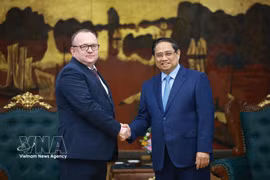 Премьер-министр Фам Минь Тьинь принимает Председателя Государственного комитета судебных экспертиз Республики Беларусь Волкова Алексея Александровича. (Фото: ВИА)