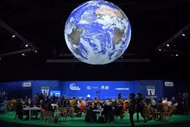 Делегаты на Конференции сторон РКИК ООН (COP26) в Глазго, Шотландия, 2 ноября 2021 года. Фото: AFP/ВИА