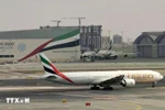 Самолет авиакомпании «Emirates» в международном аэропорту Дубая, ОАЭ. (Фото: AFP/ВИА)