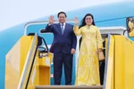 Премьер-министр Фам Минь Тьинь с супругой прибыл в стокгольмский аэропорт Арланда вечером 11 июня. (Фото: ВИA)