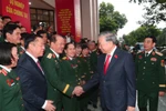 Генеральный секретарь ЦК Коммунистической партии Вьетнама То Лам, который одновременно является секретарём Центральной военной комиссии, и участники XII съезда партийной организации Народной армии Вьетнама, 30 сентября. (Фото: ВИА)