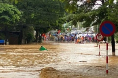 Улицы в квартале Тхукфан (провинция Каобанг) погрузились под воду из-за сильного наводнения (Фото: ВИА)