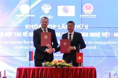 Обе стороны подписали Протокол заседания (Фото: https://mst.gov.vn)