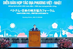 Премьер-министр Фам Минь Тьинь выступает на Форуме регионального сотрудничества Вьетнам – Япония (Фото: ВИА)