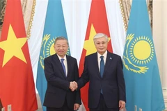 Президент Казахстана встретился и провел переговоры с Генеральным секретарем То Ламом (Фото: ВИА) 