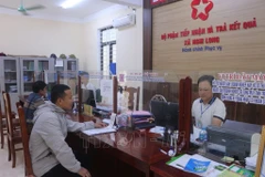 Граждане приходят для прохождения административных процедур в единый отдел общины Нгилонг (Нгилок, Нгеан) (Иллюстрация фото: ВИА)