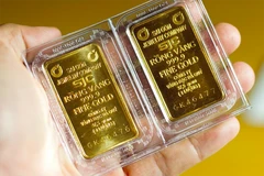 Торговля золотом на сумму от 20 миллионов донгов в день и более должна быть оплачена через банковский счет (Фото: baochinhphu.vn)