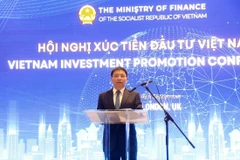 Министр Нгуен Ван Тханг выступает на конференции