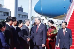 Церемония встречи Генсекретаря То Лама и его супруги в международном аэропорту Ваттай, столица Вьентьян (Фото: ВИА)