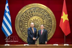 Заместитель Председателя НС Нгуен Дык Хай провёл переговоры с Первым заместителем Председателя Парламента Греции Иоаннисом Плакиотакисом (Фото: daibieunhandan.vn)