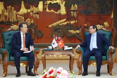 Премьер-министр Фам Минь Тьинь принял Председателя Коллегии ЕЭК (Фото: ВИА) 