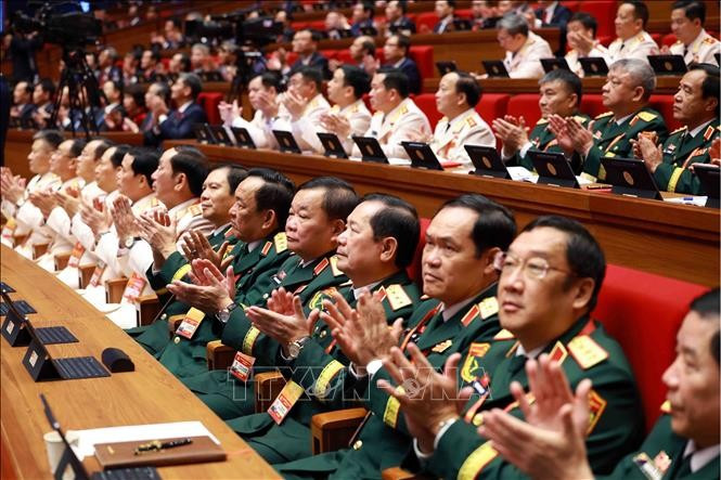 Делегаты приняли участие в заседании открытия XIV Всевьетнамского съезда Коммунистической партии Вьетнама. Фото: ВИА.