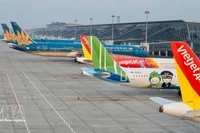 Самолеты вьетнамских авиакомпаний в Международном аэропорту Нойбай. (Фото: ВИА) 