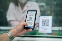 Цифровые платежи во Вьетнаме стремительно расширяются, а объём операций с QR-кодами вырос более чем на 150%. (Фото: ВИА)