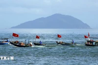 Лодки-корзины рыбаков участвуют в шествии на традиционном празднике «Каунгы» (праздник моления о рыбном промысле). (Фото: ВИА)