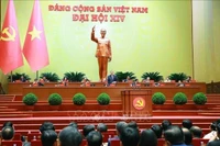 Генеральный секретарь ЦК КПВ XIII созыва То Лам выступает на XIV всевьетнамском съезде КПВ. (Фото: ВИА).