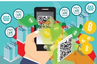 Мультивалютные карты, платёжные карты, поддерживаемые мобильным приложением, которое позволяет пользователям обменивать местную валюту на иностранную и оплачивать покупки в магазинах или онлайн, а также мобильные кошельки для повседневных расходов и трат за рубежом будут пользоваться популярностью в 2026 году. (Фото: baochinhphu.vn)