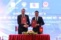 Обе стороны подписали Протокол заседания (Фото: https://mst.gov.vn)