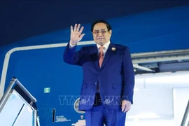 Премьер-министр Фам Минь Тьинь завершил рабочую поездку в Лаос. (Фото: ВИА).