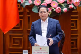 Премьер-министр Фам Минь Тьинь выступает на рабочем совещании. (Фото: baochinhphu.vn).