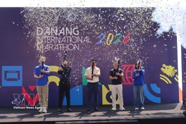 Делегаты выполняют церемонию открытия соревнования. (Фото: ВИА)