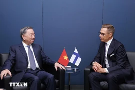 Генеральный секретарь Вьетнама То Лам встречается с Президентом Финляндии Александром Стуббом. (Фото: ВИА)