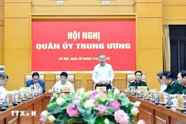 Генеральный секретарь То Лам председательствовал на заседании Центральной военной комиссии. (Фото: ВИА)