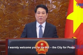 Председатель государства Лыонг Кыонг выступает с посланием по поводу церемонии открытия для подписания Конвенции ООН в Ханое. (Фото: ВИА)